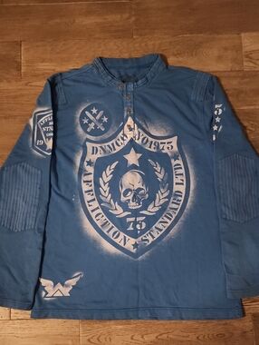Affliction Blue Long Sleeve Henley with White Graphic Skull Shield